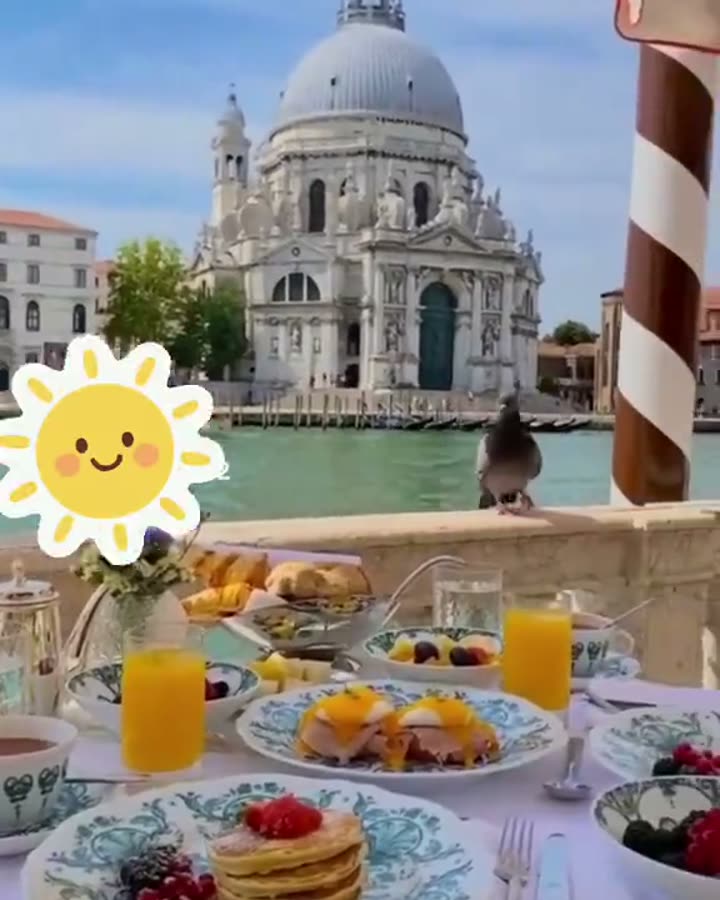 Breakfast table by the Grand Canal in Venice